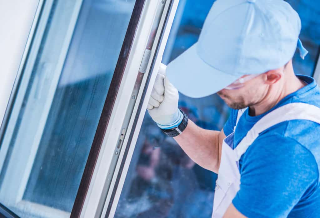 male window fitter installing new windows